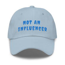 Load image into Gallery viewer, baby blue ball cap with blue letters that read not an influencer
