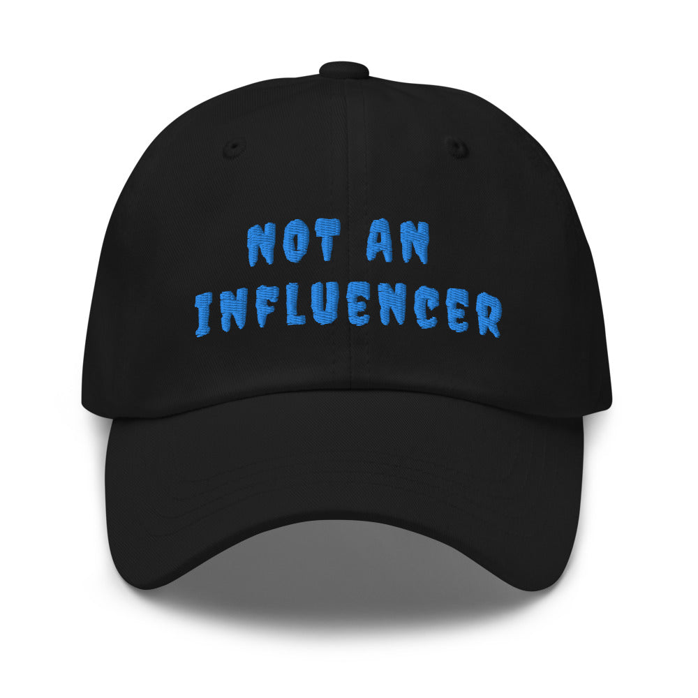 black ball cap with blue lettering that reads not an influencer