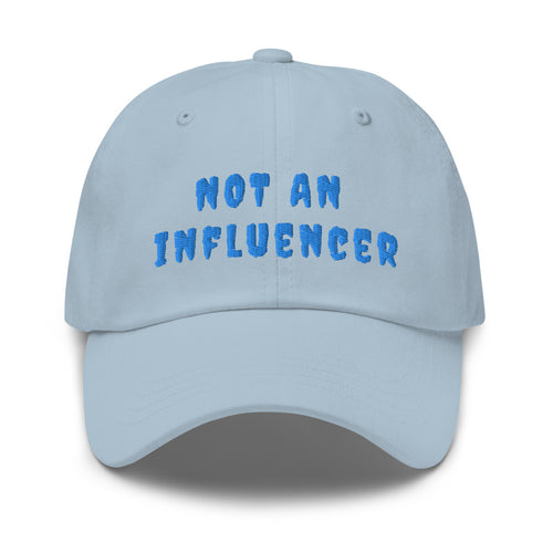 baby blue ball cap with blue letters that read not an influencer